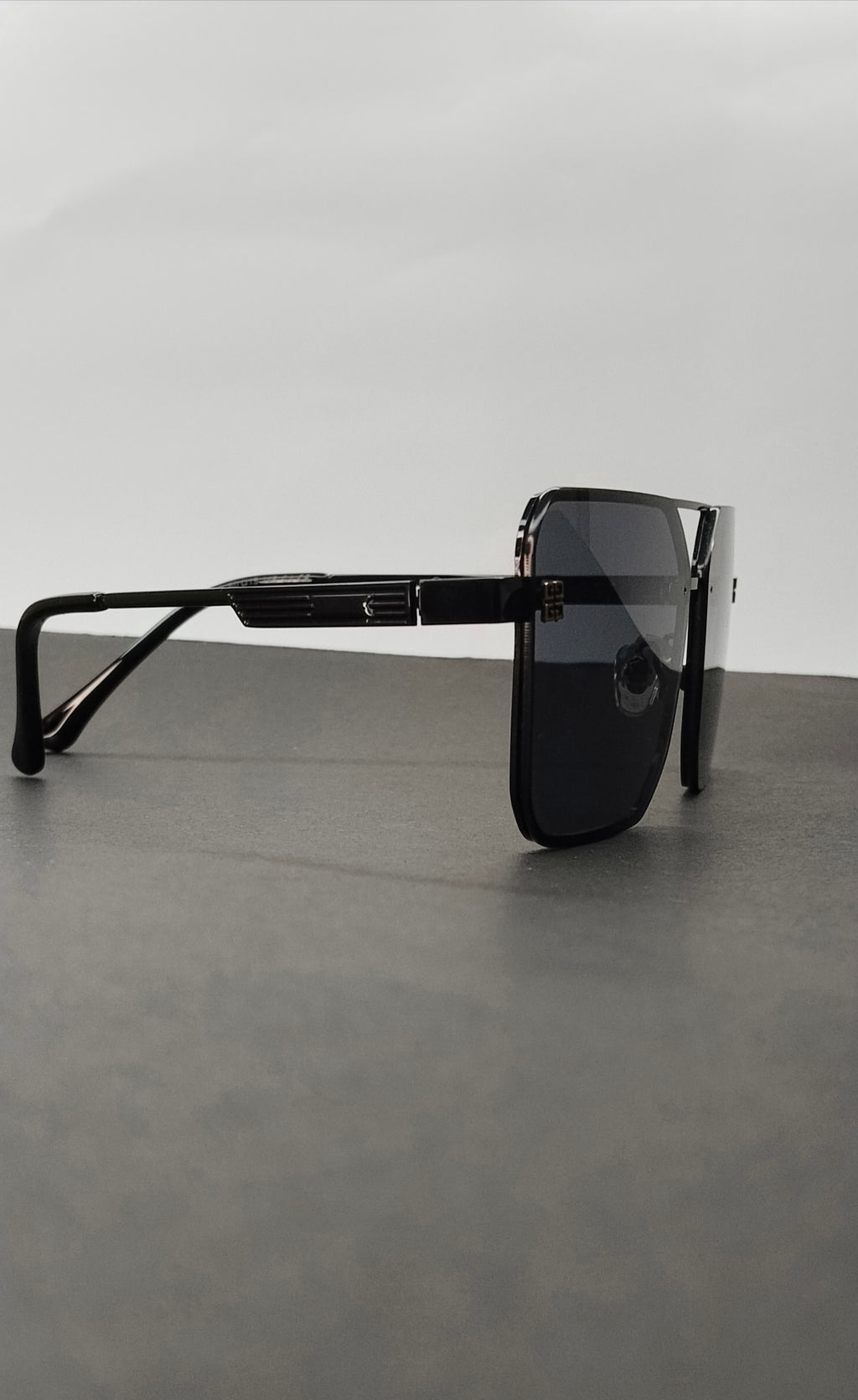 Matte Black Rimless Geometric Aviator Sunglasses