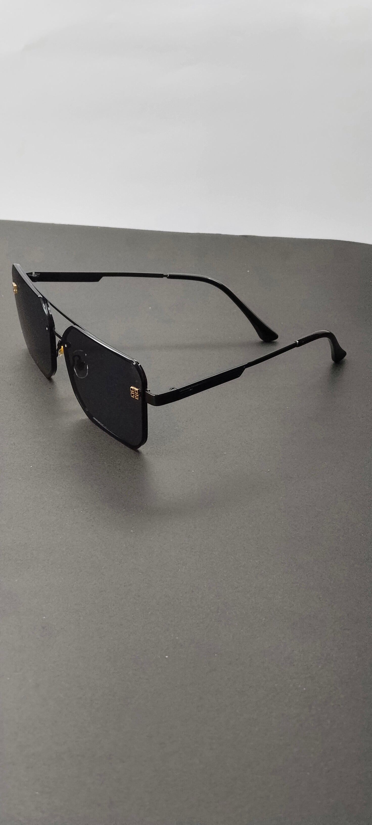 Matte Black Rimless Geometric Aviator Sunglasses